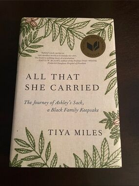 All That She Carried by Tiya Miles - Hardcover, Beige with Green Leaf Design